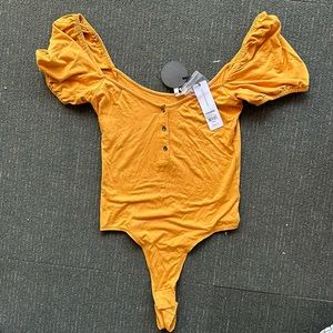 AMUSE one piece. NWT. Size small